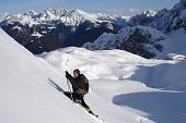 12 In verticale conil Pizzo Camino e il Rifugio sullo sfondo